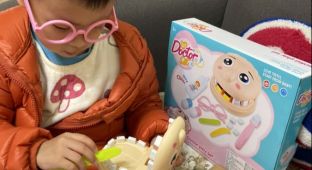The dentist is operating a bad tooth, so busy