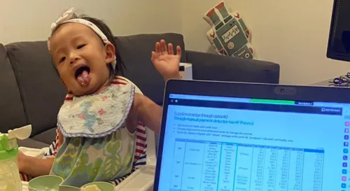 Morning conference by having this little girl breakfast beside me